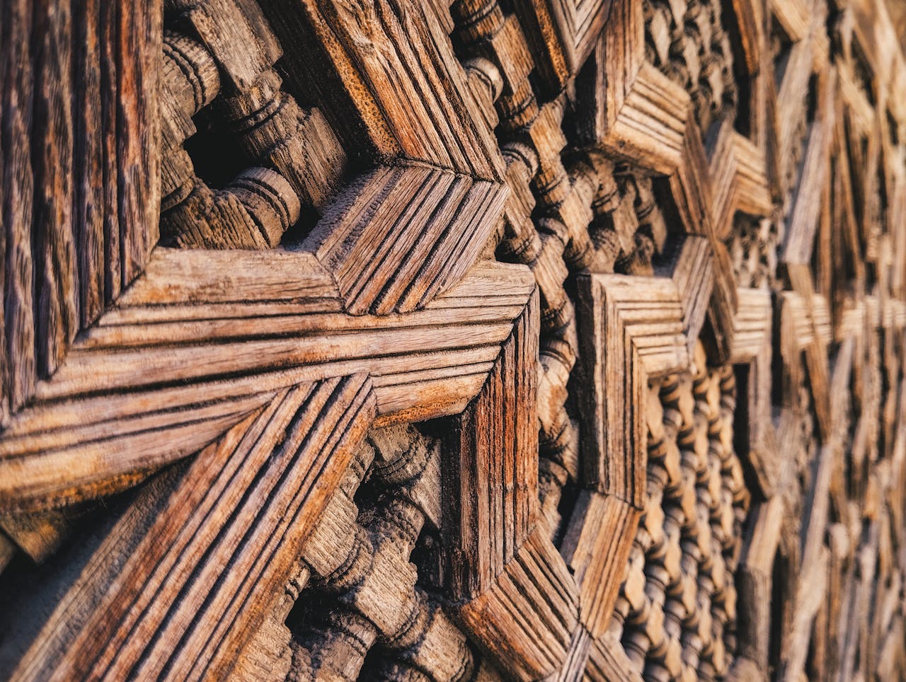 Close-up of traditional Moroccan wooden geometric pattern showcasing craftsmanship.